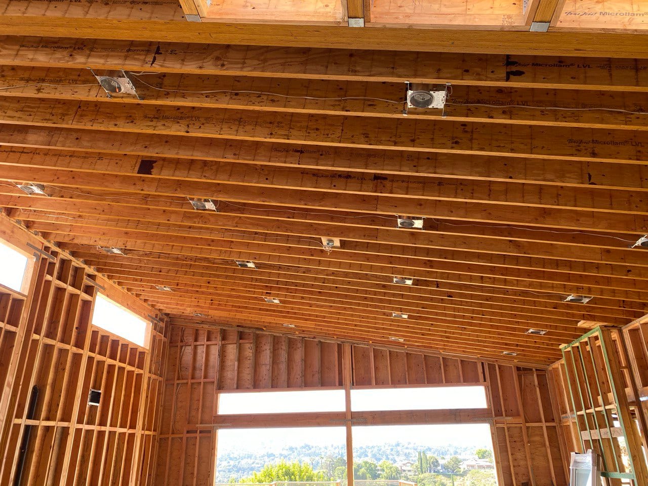 Interior framing — vaulted ridge above the great room.